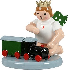 Engel kniend mit Eisenbahn