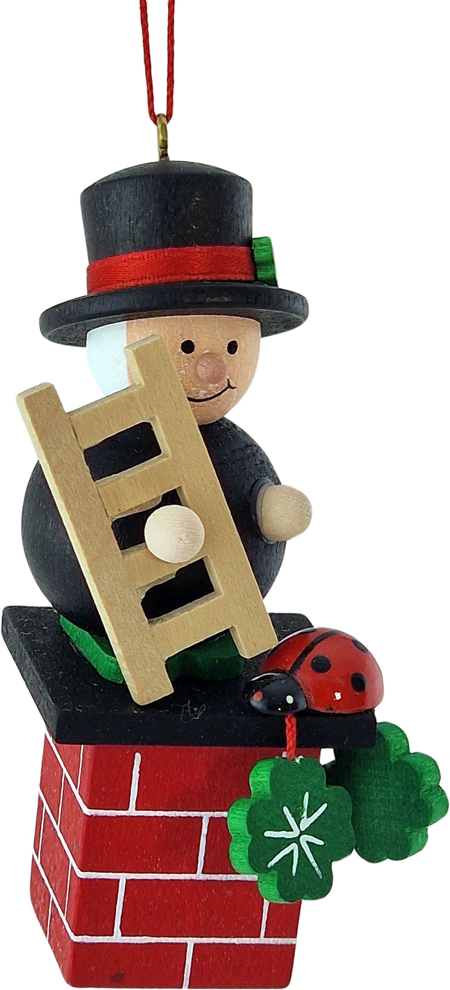 Baumbehang Kaminkehrer auf Kamin