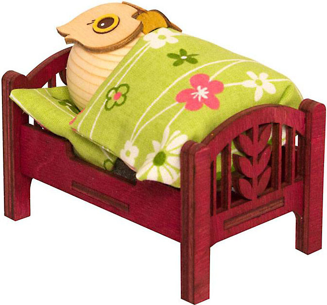 Mini-Eule im Bett