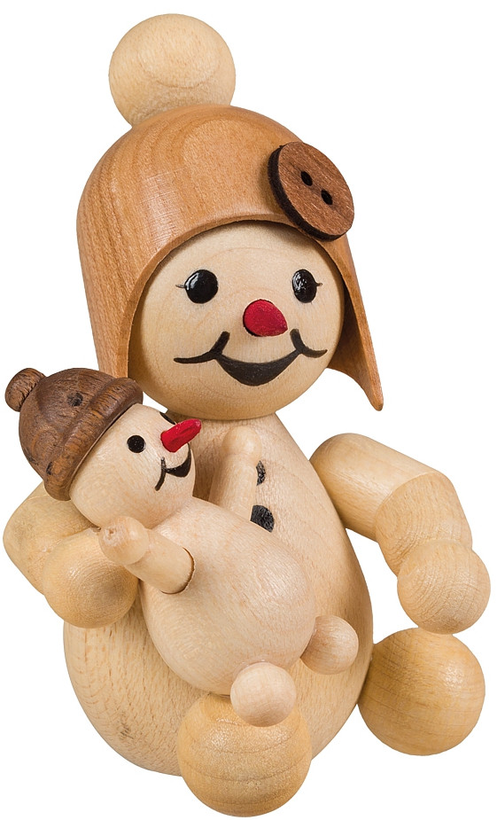 Schneemädchen mit Puppe