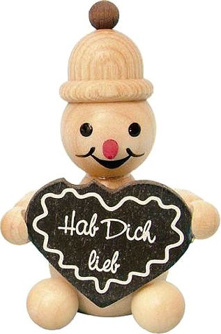 Schneemann Junior - mit Lebkuchenherz, sitzend