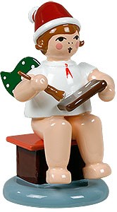 Weihnachtsengel mit Pfefferkuchen - sitzend, mit Mütze Weihnachtsengel mit Pfefferkuchen - sitzend, mit Mütze