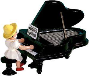 Blumenmächen am Flügel, farbig