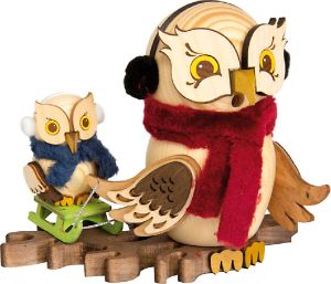 Räucherfigur Eule Schlittenfahrt mit Kind