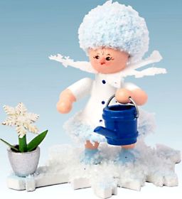 Schneeflöckchen mit Gießkanne