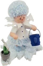 Schneeflöckchen mit Gießkanne