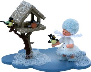 Schneeflöckchen mit Futterhaus