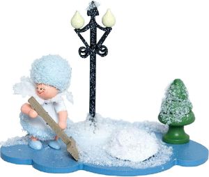 Schneeflöckchen mit Schneeschippe