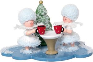 Schneeflöckchenpaar auf Weihnachtsmarkt