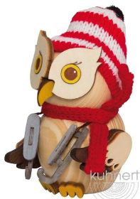 Mini-Eule mit Schlittschuhen