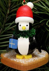 Baumbehang Pinguin auf Lebkuchenherz Baumbehang Pinguin auf Lebkuchenherz