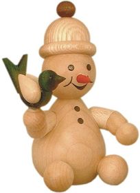 Schneemann Junior mit Vogel sitzend