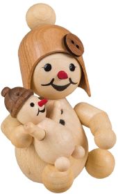 Schneemädchen mit Puppe