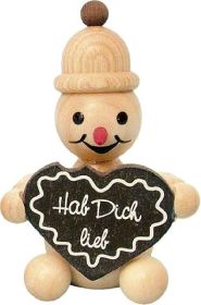 Schneemann Junior - mit Lebkuchenherz, sitzend